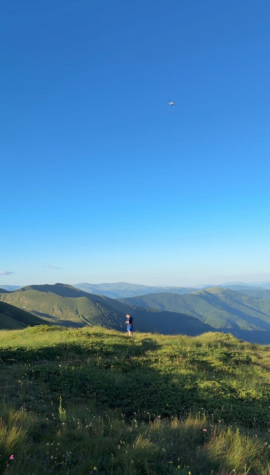 Local guide at Korabi mountain summit in Albania with drone photography