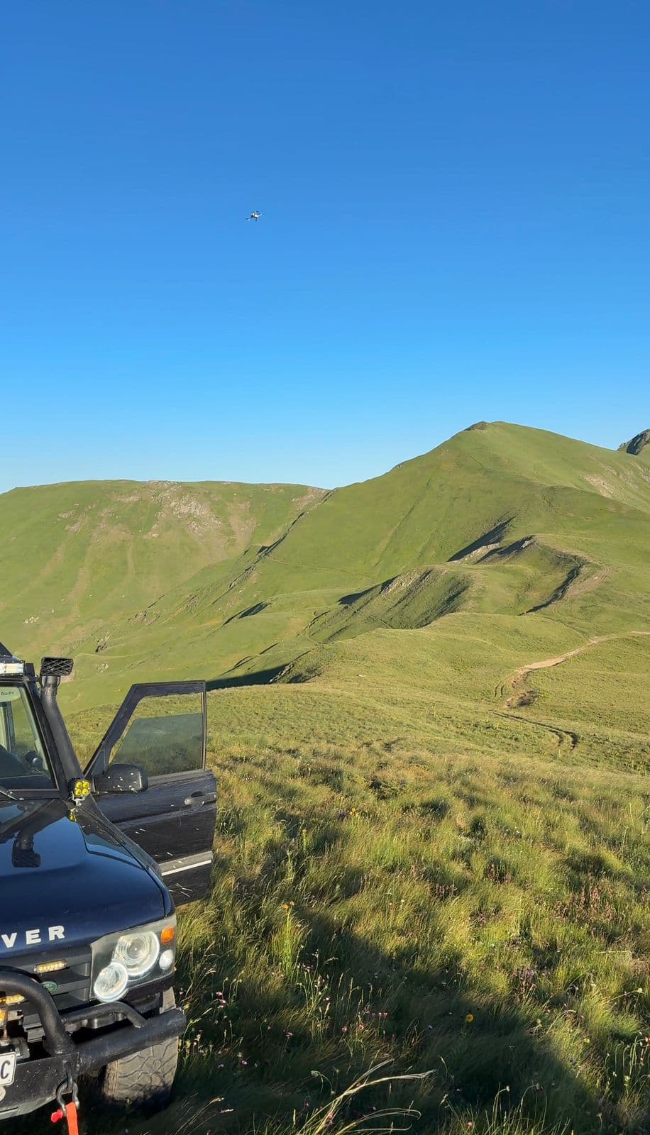 Land Rover 4x4 driving along a mountain trail in the Korabi range, Albania